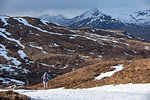 A walker at the top of the Devils Staircase while hiking along the West Highland Way near Glencoe in the Scottish Highlands, Scotland, United Kingdom, Europe