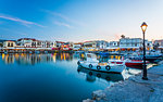 Old Venetian harbour, taverns on seaside at dusk, Rethymno (Rethymnon), Crete, Greek Islands, Greece, Europe