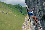 Rock climber in action, Yorkshire Dales National Park, North Yorkshire, England, United Kingdom, Europe