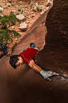 Man trad climbing, Indian Creek, Moab, Utah, USA