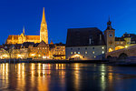 View to the Cathedral of St. Peter, the Stone Bridge and the Bridge Tower at dusk, Regensburg, Bavaria, Germany, Europe