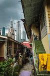 Alley in Kampung Baru with the Petronas Twin Towers in the background, Kuala Lumpur, Malaysia, Southeast Asia, Asia