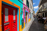 View of back street colourful doors and restaurant, Funchal, Madeira, Portugal, Atlantic, Europe