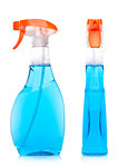 Bottles of domestic blue glass cleaner spray on white background