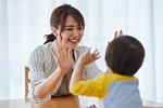 Japanese mother and kid playing