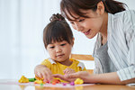 Japanese mother and kid playing