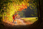 Mom teach her daughter to love nature, Como province, Lombardy, Italy, Europe