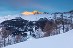 Pizzo Ferré and Pizzo dei Piani burning up at the first rays of sunrise, Spluga valley, Sondrio province, Lombardy, Italy, Europe