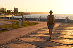 A tourist walk on Campeche promenade at sunset, San Francisco de Campeche, state of Campeche, Mexico.