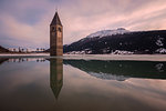 The bell-tower of Graun in Vinschgau, Reschensee - Lago di Resia, Bolzano, South Tyrol, Trentino Alto Adige, Italy