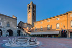 Piazza Vecchia with civic tower and Fontana del Contarini. Bergamo(Upper Town), Lombardy, Italy.