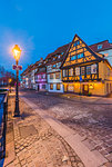 Colorful half timbered houses at night, Colmar, France