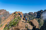 People walking on the trail from Pico Ruivo to Pico do Areeiro. Funchal, Madeira region, Portugal.