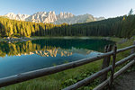 The Carezza Lake/Karersee and the spiers of Latemar, Dolomites, South Tyrol, Bolzano province, Trentino Alto Adige, italy