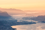 Overview of Lecco and Adda river from San martino mount at dawn, Lecco, Lecco province, Lombardy, italy