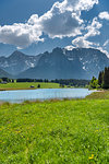 Mittenwald, district of Garmisch-Partenkirchen, Upper Bavaria, Germany, Europe. View over the Schmalen Lake to the mountains of the Karwendel