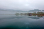 Schlehdorf, Kochel Lake, Bad Tölz-Wolfratshausen district, Upper Bavaria, Germany, Europe. Three boathouses in the Kochel Lake in the early morning