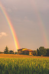 Rainbow in Franciacorta at sunset, Lombardy district, Brescia province, Italy.