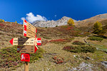 Hiking signage of Stelvio National Park, Val Vezzola, Valdidentro, Valtellina, Sondrio province, Lombardy, Italy