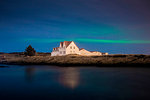 Lonely houses under northern lights, Keflavik, Iceland