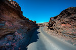 A road on the lava fields, Timanfaya National Park, Lanzarote, Canary island, Spain, Europe