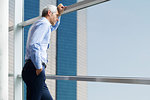 Businessman standing near window