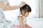 Japanese mother and daughter at home