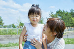 Japanese mother and daughter at the park