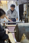 Japanese artisans working in the studio