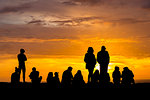 Silhouette of people enjoying sunset at Cape Saint-Vincent, the most southwestern point of Europe, Sagres, Algarve, Portugal, Europe