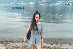 Woman by lakeside, Como, Lombardia, Italy