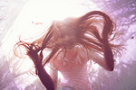 Girl peering through trampoline