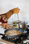 Making mushroom risotto