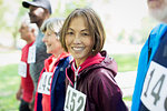 Portrait smiling, confident active senior woman at sports race starting line