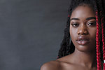 Portrait confident, cool young woman with red braids