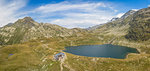 Aerial panoramic of Lake Emet, Rifugio Bertacchi and peak Emet, Spluga Valley, Sondrio province, Valtellina, Lombardy, Italy, Europe