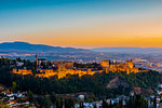 View of Alhambra, UNESCO World Heritage Site, and Sierra Nevada mountains at dusk, Granada, Andalucia, Spain, Europe