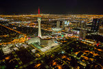 View of Las Vegas and Stratosphere Tower from helicopter at night, Las Vegas, Nevada, United States of America, North America