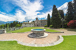 Gardens and facade of Piona Abbey (Abbazia Priorato di Piona), Colico, Lecco province, Lombardy, Italy, Europe