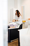 Hairdresser washing clients hair in Sweden