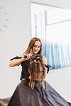 Hairdresser cutting clients hair in Sweden