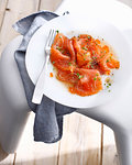 Plate of smoked salmon carpaccio