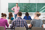 Teacher addressing students in class