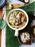 Pot of vegetable curry with rice