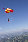 Person parachuting over Thurgau, Switzerland