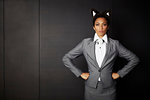 Businesswoman wearing fancy dress ears