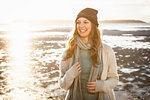 Happy young woman on the beach