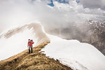 Young man mountain trekking in Bavarian Alps, Oberstdorf, Bavaria, Germany