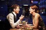 Couple laughing in restaurant