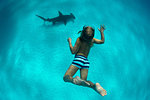 Boy with nurse shark, Bimini, Bahamas